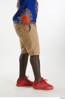 Kato Abimbo  1 beige shorts casual dressed flexing leg…